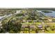 Aerial view showcasing home's waterfront location at 543 Lincoln Nw Ave, Port Charlotte, FL 33952