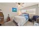 Bedroom with a double bed, guitar, and dresser at 543 Lincoln Nw Ave, Port Charlotte, FL 33952