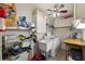 Well-equipped laundry room with washer, dryer, and utility sink at 543 Lincoln Nw Ave, Port Charlotte, FL 33952