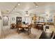 Bright dining room with seating for six and kitchen access at 543 Lincoln Nw Ave, Port Charlotte, FL 33952