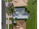 Aerial view of single Gathering home with grey roof at 25072 Purple Emperor Way, Punta Gorda, FL 33955