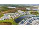 Aerial view of the Brightmore community with lakes and conservation areas at 11247 Boundless Ter, Venice, FL 34293