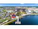 Aerial view of waterfront community with shops and a park at 11247 Boundless Ter, Venice, FL 34293