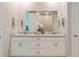 Double vanity bathroom with modern finishes at 11247 Boundless Ter, Venice, FL 34293