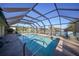 Relaxing screened pool with canal view and plenty of sunshine at 18404 Lake Worth Blvd, Port Charlotte, FL 33948