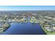 Aerial view showcasing canal-front property and surrounding neighborhood at 18404 Lake Worth Blvd, Port Charlotte, FL 33948