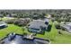 Aerial view of canal-front home with private pool and dock at 18404 Lake Worth Blvd, Port Charlotte, FL 33948
