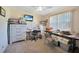 Cozy bedroom with a dresser, work table, and plenty of storage at 18404 Lake Worth Blvd, Port Charlotte, FL 33948