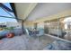 Spacious covered patio with access to the pool and dining area at 18404 Lake Worth Blvd, Port Charlotte, FL 33948