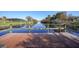 Wooden dock overlooks a peaceful canal, perfect for enjoying waterfront living at 18404 Lake Worth Blvd, Port Charlotte, FL 33948
