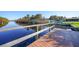 Enjoy this peaceful waterfront dock with canal views at 18404 Lake Worth Blvd, Port Charlotte, FL 33948