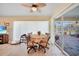 Casual dining area with table and chairs near sliding glass doors at 18404 Lake Worth Blvd, Port Charlotte, FL 33948