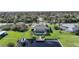 Waterfront property with a single-story house, pool, and private dock at 18404 Lake Worth Blvd, Port Charlotte, FL 33948