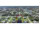 Wide aerial showcasing home's location in a residential neighborhood at 18404 Lake Worth Blvd, Port Charlotte, FL 33948