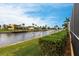 Waterfront property with lush landscaping and access to the canal at 1215 Via Tripoli, Punta Gorda, FL 33950