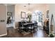 Charming dining room with a chandelier, large window, and elegant decor at 1215 Via Tripoli, Punta Gorda, FL 33950