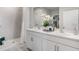 Double vanity bathroom with a walk-in shower at 12182 Kneeland Ter, Port Charlotte, FL 33981