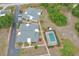 Aerial view of community with buildings and pool at 25068 Harborview Rd # 2A, Punta Gorda, FL 33980