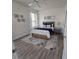 Comfortable bedroom with stylish decor, plush bed, and soft natural light, creating a cozy and relaxing retreat at 2765 Arugula Dr, North Port, FL 34289