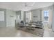 Inviting living room with comfortable seating, lots of natural light, and a beachy vibe at 2765 Arugula Dr, North Port, FL 34289