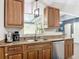 Bright kitchen featuring stainless steel appliances, granite countertops, and natural light at 3316 Kacher Rd, North Port, FL 34288