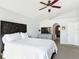 Serene main bedroom featuring a spacious layout, soft lighting, and stylish furnishings for ultimate comfort at 3316 Kacher Rd, North Port, FL 34288