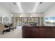 Open living space with water views, comfortable seating, and a dining area at 3636 Aruba Ct, Punta Gorda, FL 33950