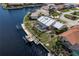 Aerial view of waterfront home with private pool and boat dock at 3636 Aruba Ct, Punta Gorda, FL 33950