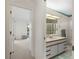 Bathroom with vanity and access to another bathroom at 3636 Aruba Ct, Punta Gorda, FL 33950