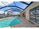 Relaxing pool and patio area with canal view at 3636 Aruba Ct, Punta Gorda, FL 33950