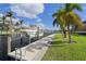 Private dock with boat lift and steps into the water at 3636 Aruba Ct, Punta Gorda, FL 33950