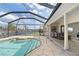Inviting pool and spa with covered patio at 3636 Aruba Ct, Punta Gorda, FL 33950