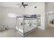 Guest bedroom with a bunk bed and closet at 3636 Aruba Ct, Punta Gorda, FL 33950