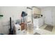 Laundry room with washer, dryer, and extra storage at 3636 Aruba Ct, Punta Gorda, FL 33950