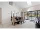 Elegant dining room with a view of the pool and canal at 3636 Aruba Ct, Punta Gorda, FL 33950