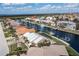 Bird's eye view showcasing canal front property and neighborhood at 3636 Aruba Ct, Punta Gorda, FL 33950