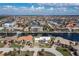 High-angle view of house and surrounding neighborhood; great waterfront location at 3636 Aruba Ct, Punta Gorda, FL 33950