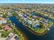 Aerial view of waterfront home with private dock and pool at 941 Don Juan Ct, Punta Gorda, FL 33950