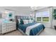 Spacious bedroom with plush bedding and large window at 4825 Sines Ln, Port Charlotte, FL 33981