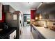 Kitchen with stainless steel appliances and ample counter space at 21451 Glendale Ave, Port Charlotte, FL 33952
