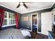Cozy bedroom with a double bed and access to a closet at 21451 Glendale Ave, Port Charlotte, FL 33952