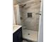 Updated bathroom with a shower and modern fixtures at 21451 Glendale Ave, Port Charlotte, FL 33952