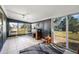 Sunroom with tiled floors and access to the backyard at 21451 Glendale Ave, Port Charlotte, FL 33952