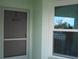 Front door and window of condo unit 4203 at 5725 Greenwood Ave # 4, North Port, FL 34287