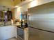 Kitchen with stainless steel appliances and granite countertops at 5725 Greenwood Ave # 4, North Port, FL 34287