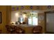Kitchen features a breakfast bar and modern appliances at 5725 Greenwood Ave # 4, North Port, FL 34287