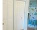 Guest bathroom with shower and linen closet at 5725 Greenwood Ave # 4, North Port, FL 34287