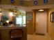 Galley kitchen with granite countertops and stainless steel appliances at 5725 Greenwood Ave # 4, North Port, FL 34287