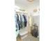 Large walk-in closet with ample hanging space and shelving at 5725 Greenwood Ave # 4, North Port, FL 34287