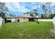 Large backyard with a gazebo and privacy fence at 5895 Bannock Cir, North Port, FL 34288